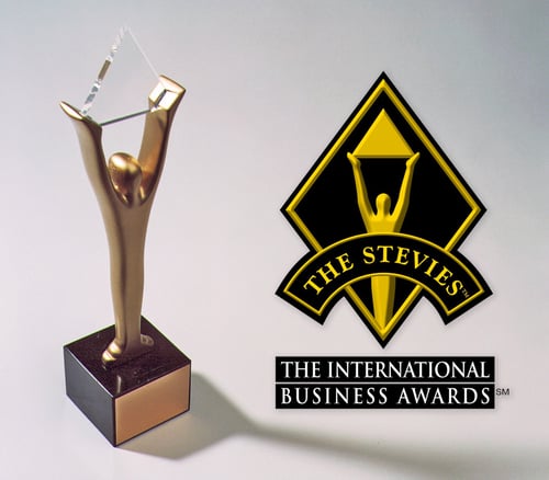 The Stevies award which is a gold human figure with arms upraised and holding a glass triangle.